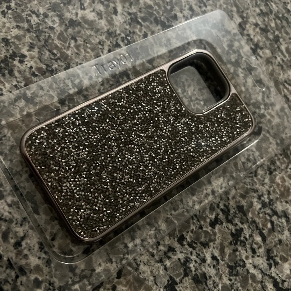 NEW in box. Fits iPhone 13Pro like a glove 👌🏽